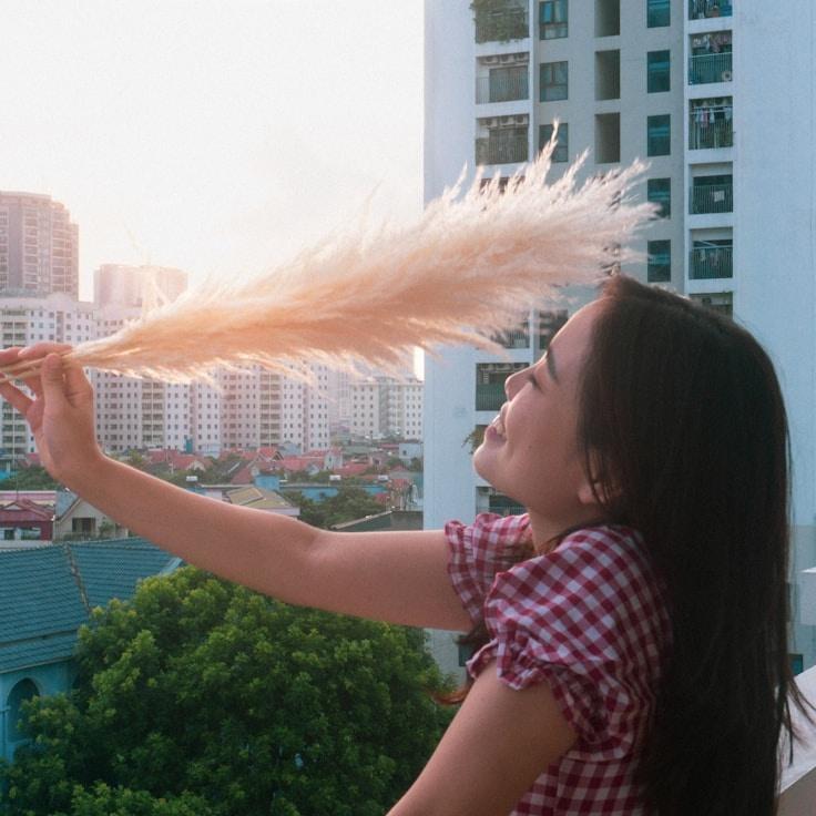 Alex Rivera, Lead Design Curator at Sunrise Pixel Wood, reviewing corporate floral arrangements